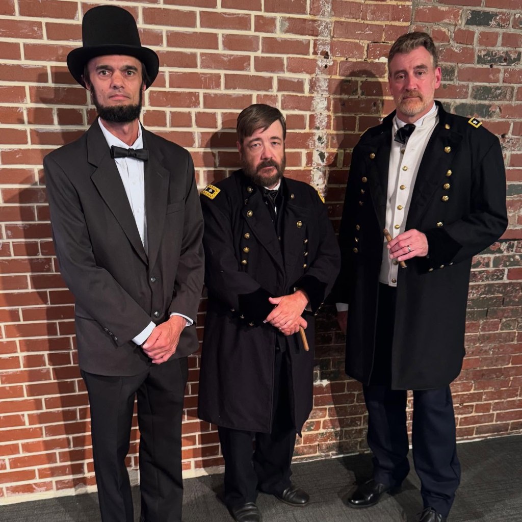 Post-performance photo featuring Mike Kinney as Abraham Lincoln and Generals Grant and Sherman